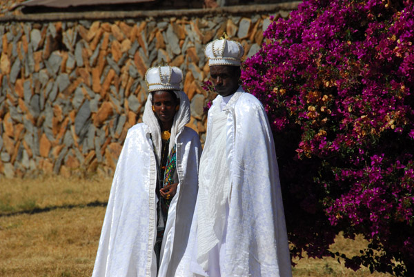 Ethiopian bride and groom posing for photos at the Axum stelae field