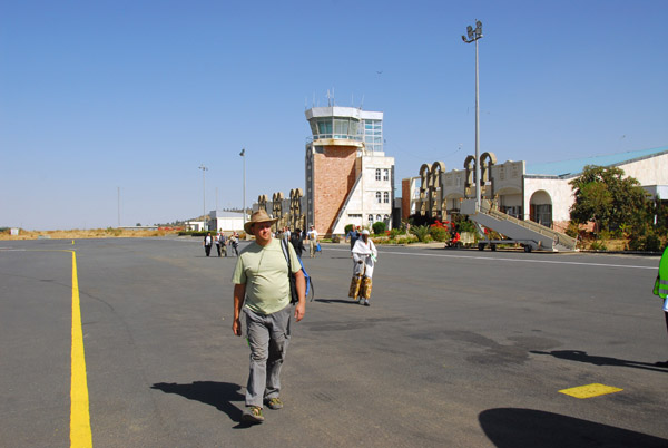 Keith walking to the airplane, Axum Airport