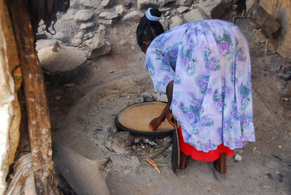 Woman preparing injera bread