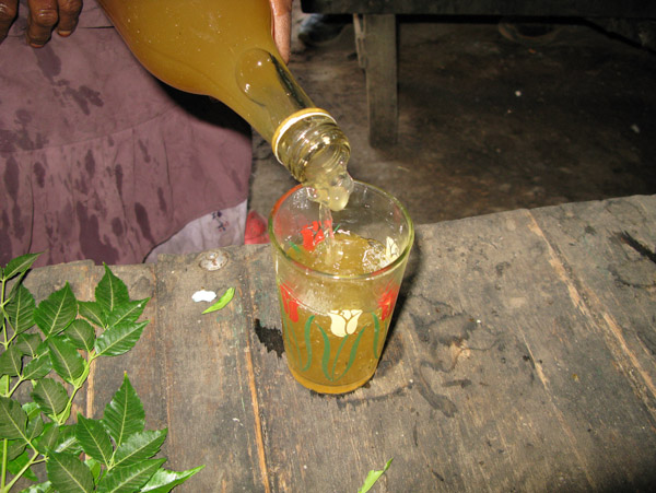Pouring Tej...after getting rid of the dead bugs