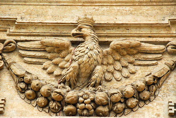 Eagle, reminiscent of Imperial Rome, on either side of the central portal to St. Peter's Basilica
