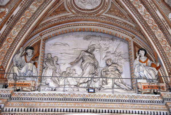 Bernini's relief Pasce Oves Maes between St. Telesphorus and St. Xystus over the main portal