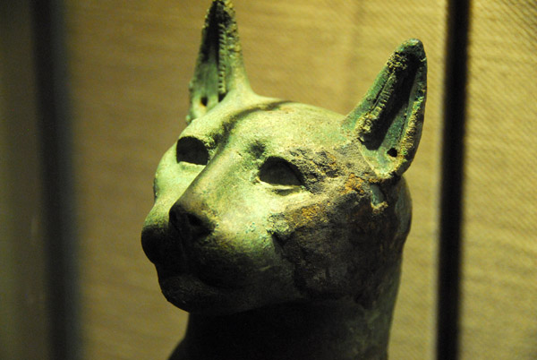 Hollow bronze cast of the cat goddess Bastet containing the mummy of a cat, XXII Dynasty (945-712 BC)