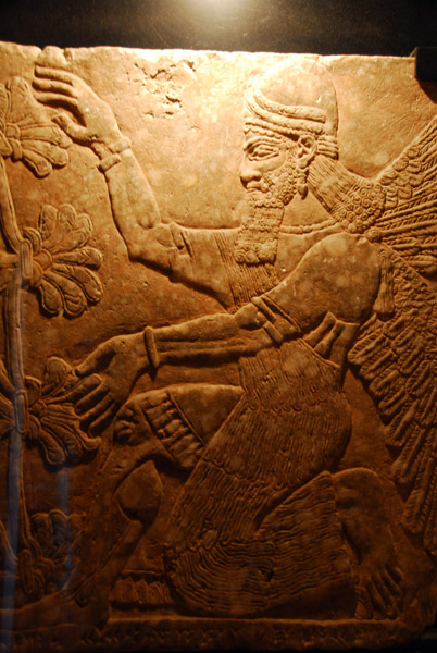 Winged figure kneeling in front of the Sacred Tree, Assyrian, (Ashurnasirpal II) 883-859 BC
