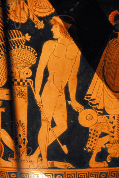 Red figure Greek pottery with a naked youth