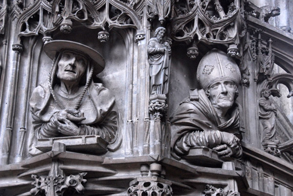 Late gothic pulpit with carvings of the original Four Doctors of the Church, St. Jerome on the left and St. Ambrose on the right