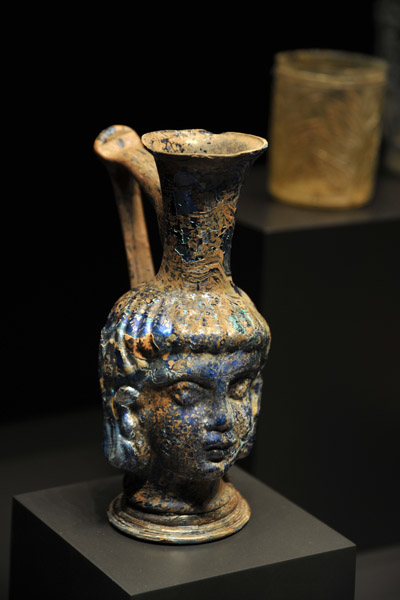 Flask in the shape of a head made of mold-blown glass, Roman 300-500 AD