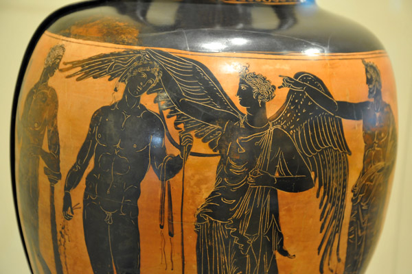 Nike, goddess of victory, crowns a victorious boxer, Athens, 363-362 BC
