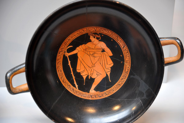 Kylix (wine cup) with a Reveler, Greek ca 480 BC