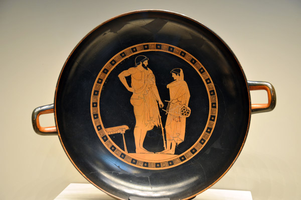 Kylix (wine cup) with a boy holding a lyre standing in front of his music teacher, Athens ca 480 BC