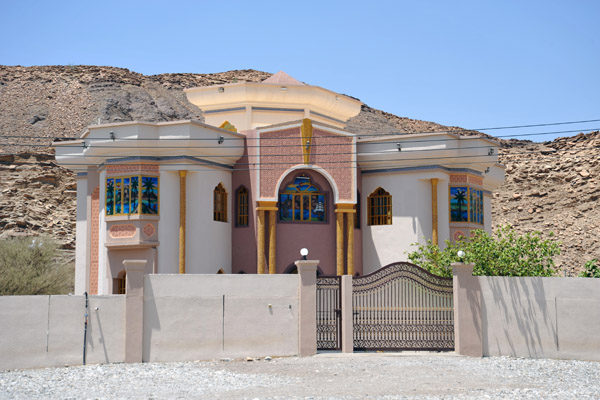 Villa with very colorful stained glass windows near Al Hayl, Oman