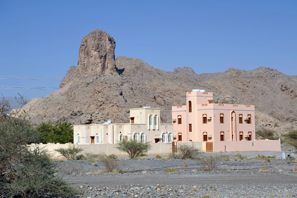 Villas on the edge of Al Hamra along the road to Bahla