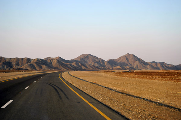 Oman Highway 9 reaches the coastal highway 58km south of Sohar's Globe Roundabout