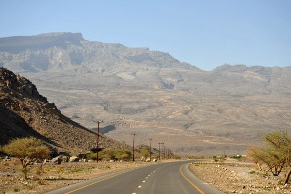 Jabal Shams with the windy dirt road leading up to Hayl As Sas