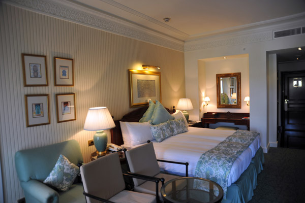 Guest room of the Al Bustan Palace Hotel