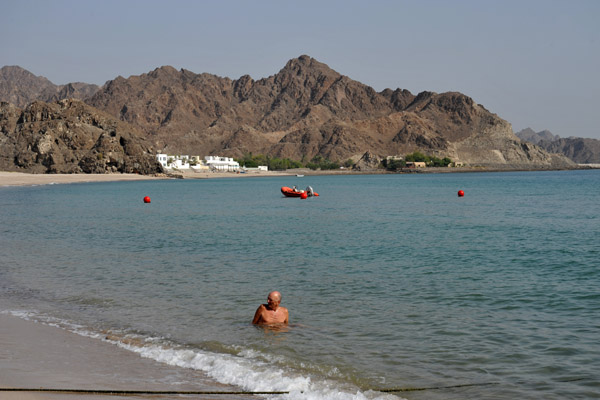 Dad taking a dip at the Al Bustan Palace's beach