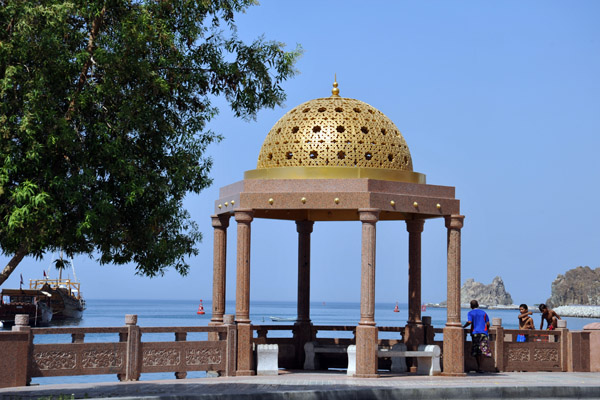 Small gold-domed pavilion on the Muscat Corniche