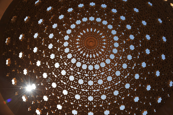 Sun shining through the dome of a pavilion along the Mutrah Corniche