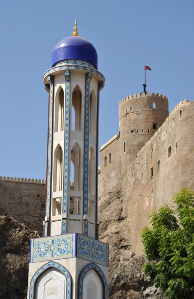 Minaret of Al Khawr Mosque with Mirani Fort, Muscat