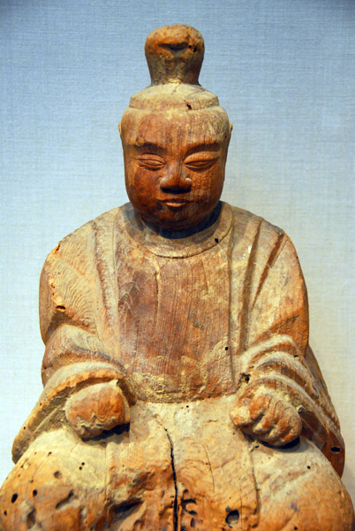 Male figure in court dress, 14th C. Japan