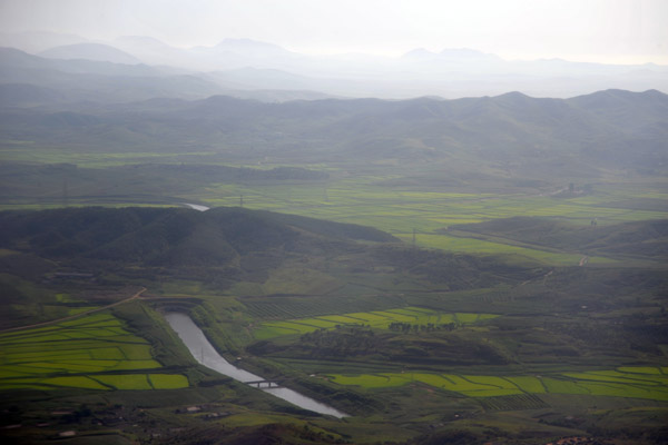 Here a canal tunnels through a mountain emerging on the otherside, South Phyongan Province, DPRK
