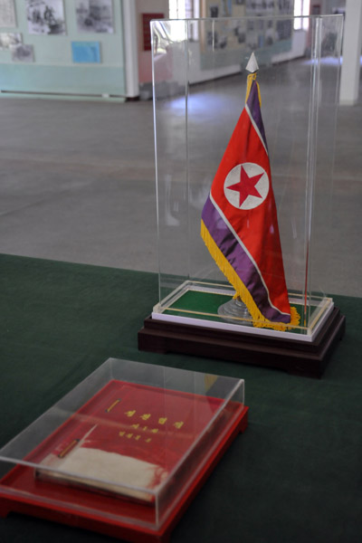 Flag of the DPRK delegation on the original table