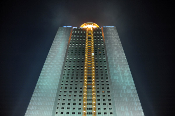 Yanggakdo International Hotel illuminated at night, Pyongyang