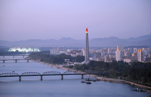 Juche Tower illuminated at dusk, Pyongyang