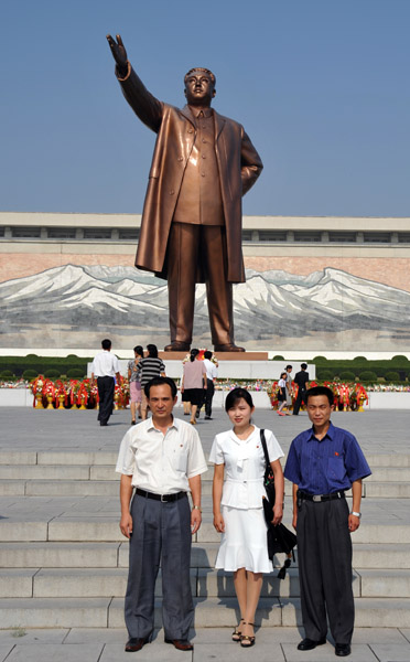 Our three DPRK guides - senior guide Mr. Kim, Miss Kim Song Sim, and Mr. Oh