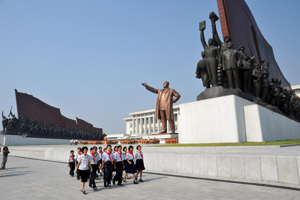The Young Pioneers depart for the next stop on their Liberation Day Kim Il Sung pilgrimage