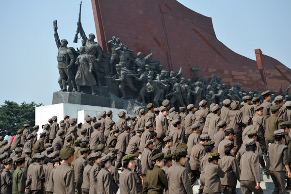 North Korean work unit in Mao suits at the Mansu Hill Grand Monument