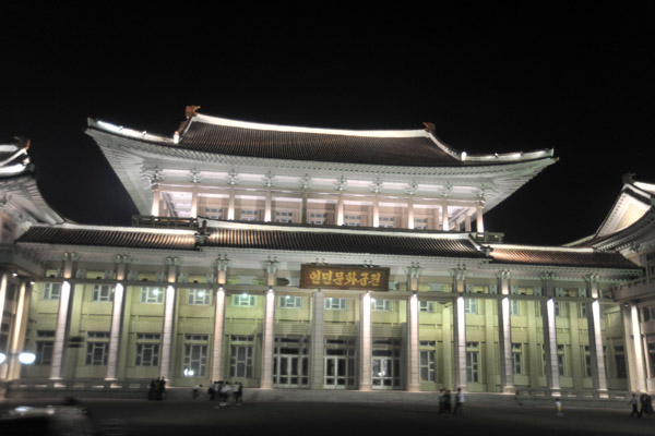 Pyongyang Grand Theatre illuminated at night