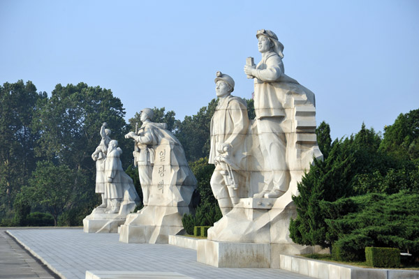 3 of the 6 monumental statues next to Juche Tower