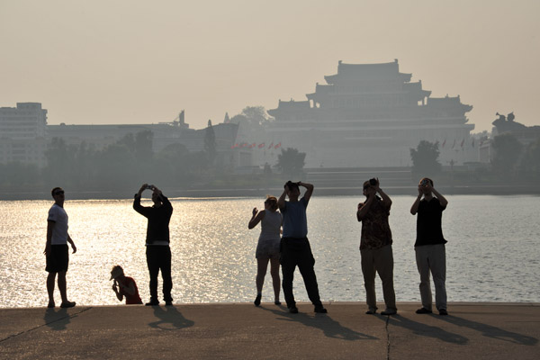 Some of our group along the Taedong River at Juche Tower