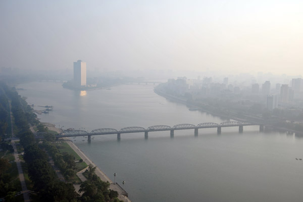 View south along the Taedong River to the Yanggakdo Hotel, Pyongyang