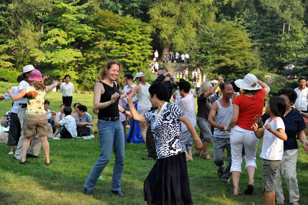 Nancy, the American guide from Beijing, daning in Moranbong Park
