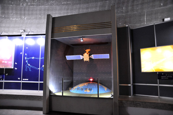 Three Revolutions Exhibition - model of a North Korean satellite