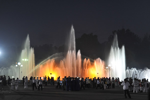 Illuminated fountain in front of Rungrado May Day Stadium