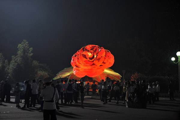 Giant illuminated statue of a Kimjongilia, a flower developed for the Dear Leader's birthday in 1988