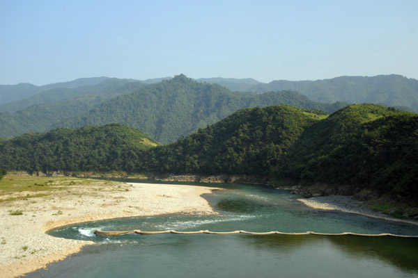 A small dam on the Chongchon River which diverts water through a tunnel to a hydroelectric plant