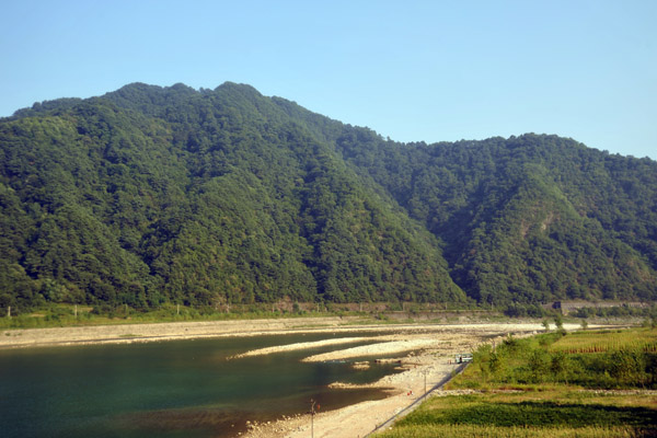 Thickly forested hills at Sonwang-bong at the entrance to the Myohyangsan Nature Reserve, DPRK