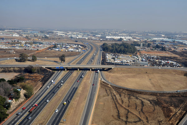 Bartlett, South Africa - crossing the N12 on final approach to 01R at JNB