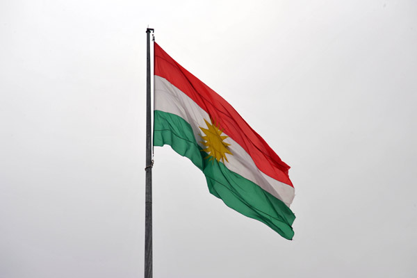 Flag of Iraqi Kurdistan flying over Erbil Citadel