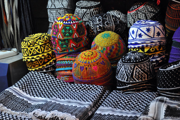Embroidered Kurdish caps and keffiyeh