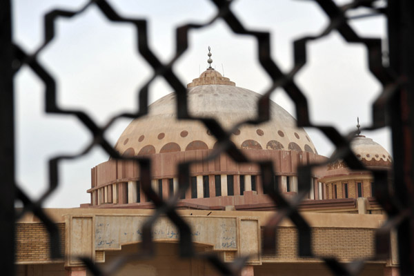 Looking through the fence at the mosque dome