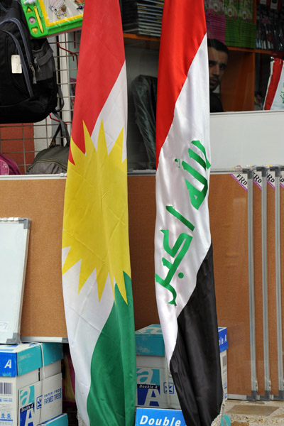 Flags of Kurdistan and Iraq in a shop