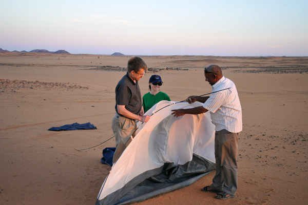 Setting up camp the first night out of Khartoum (hint...next time, Mahmoud, make sure all the parts are there...)