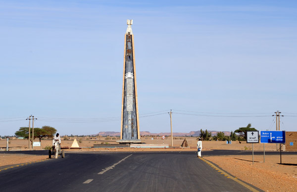 Obelisk-like monument at the junction of the Desert Highway and the Nile Valley road