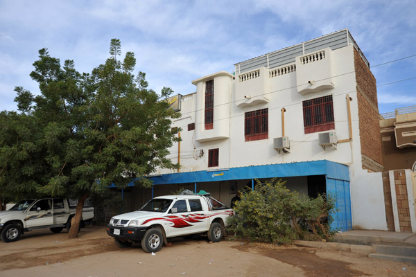 The truck parted in front of the hotel in New Dongola