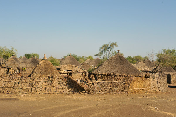 Village of thatched rondavels west of Al Gedarif, Eastern Sudan